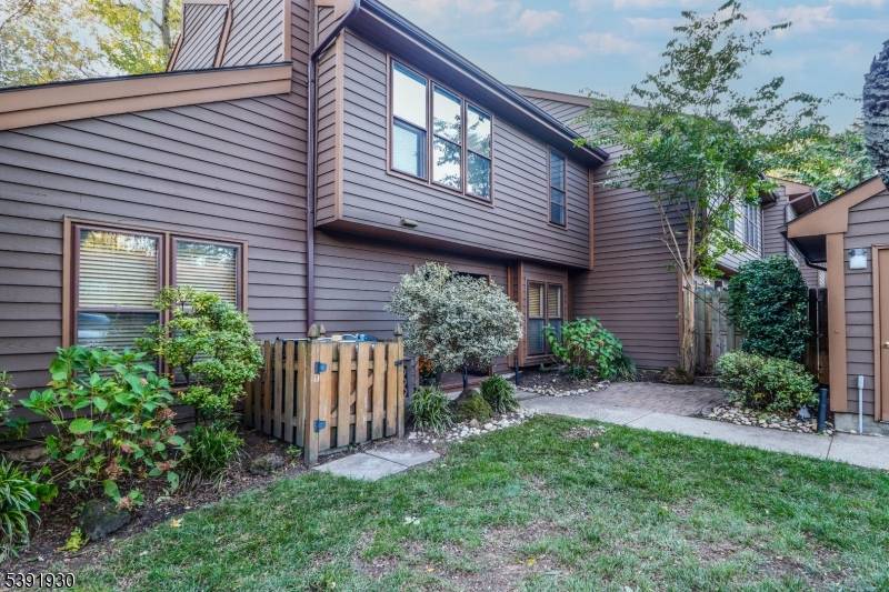 Stunning multi level end unit townhome located in desirable Timberline complex with pool and tennis courts tucked away on quiet Cul de sac in North Edison.