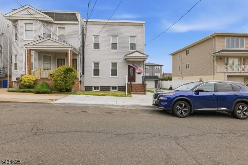 Amazing opportunity to own a fully renovated 2 family house with a finished basement and separate entrance !