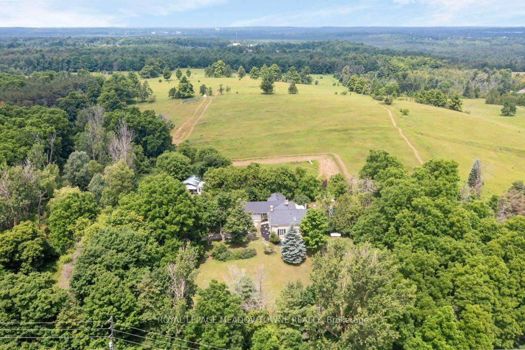 Experience the timeless beauty of this majestic 1832 Century Stone Farmhouse, nestled on a private 10 acre setting for families seeking space, comfort and nature.