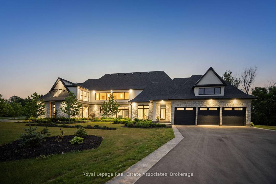 Welcome to an architectural masterpiece nestled on 18 private acres of picturesque landscape.