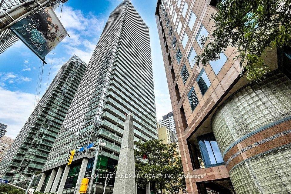 Bright open concept 1 Den Corner Unit in the Heart of Toronto !