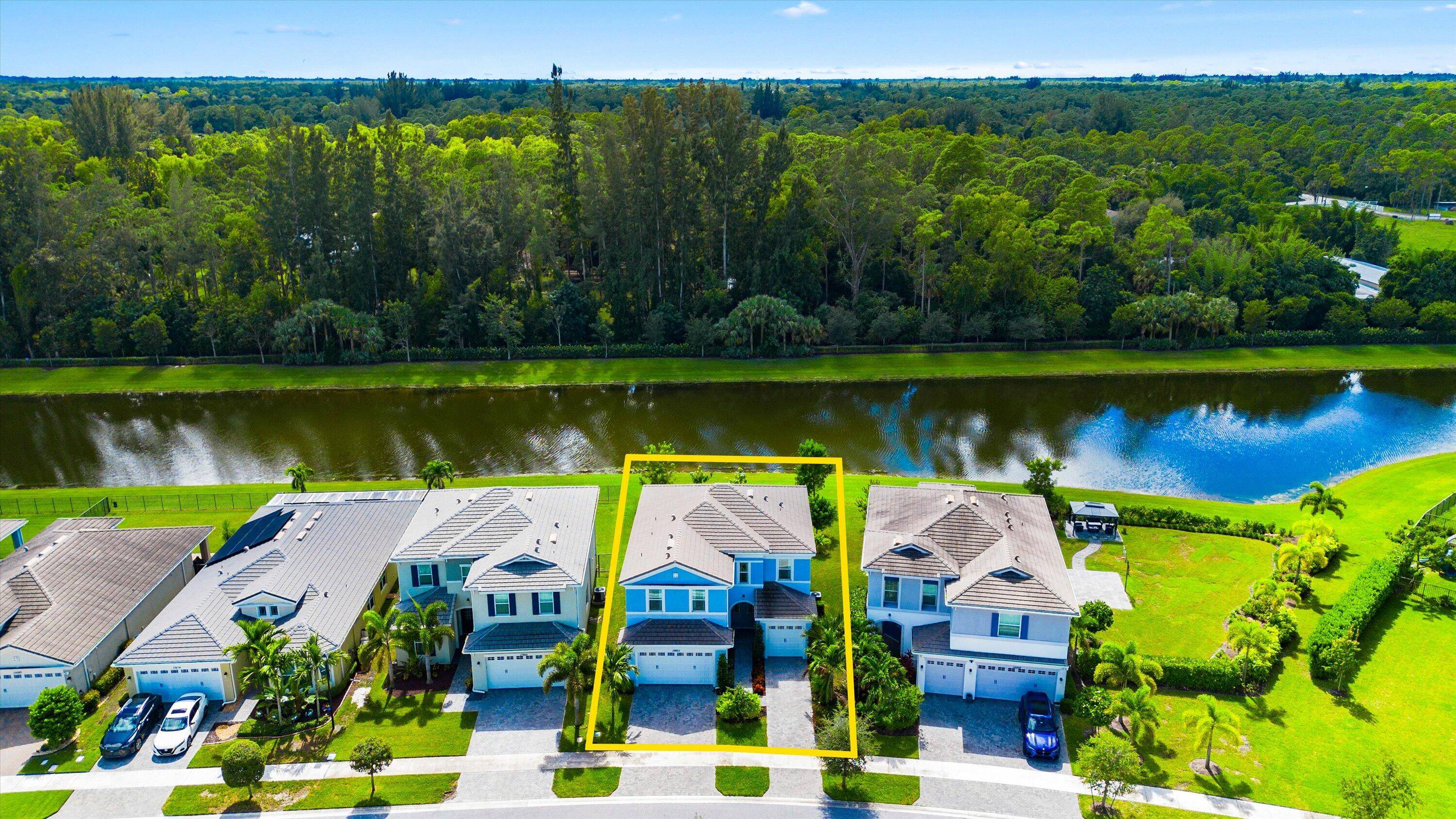 Welcome to this stunning Poinciana model located in the highly sought after Groves community of Westlake, Florida.