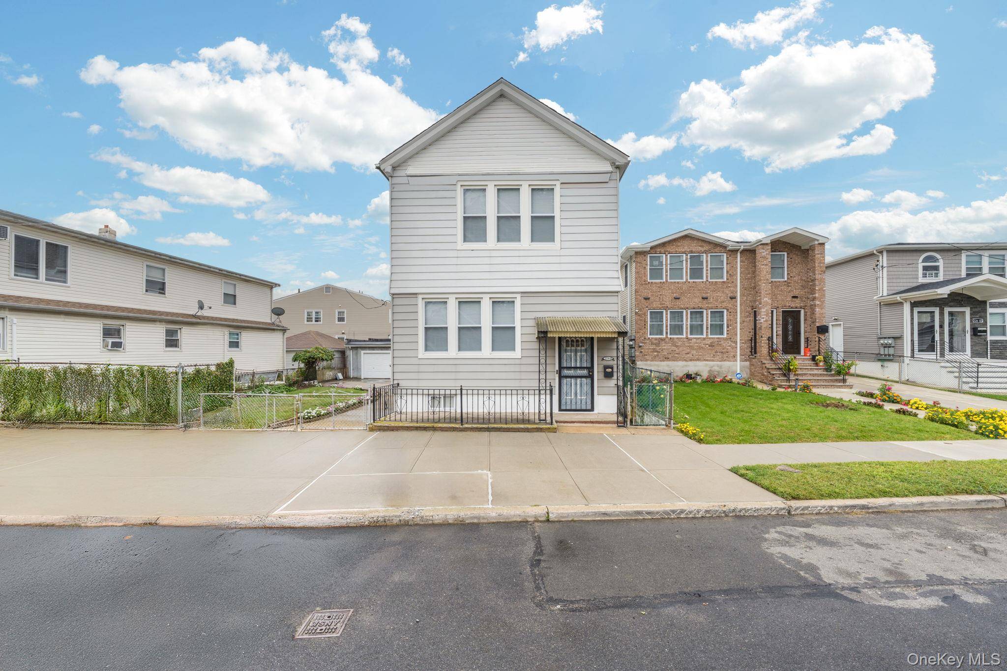 Humongous 2 Family Cottage on Oversized Lot with 4 Car Garage !