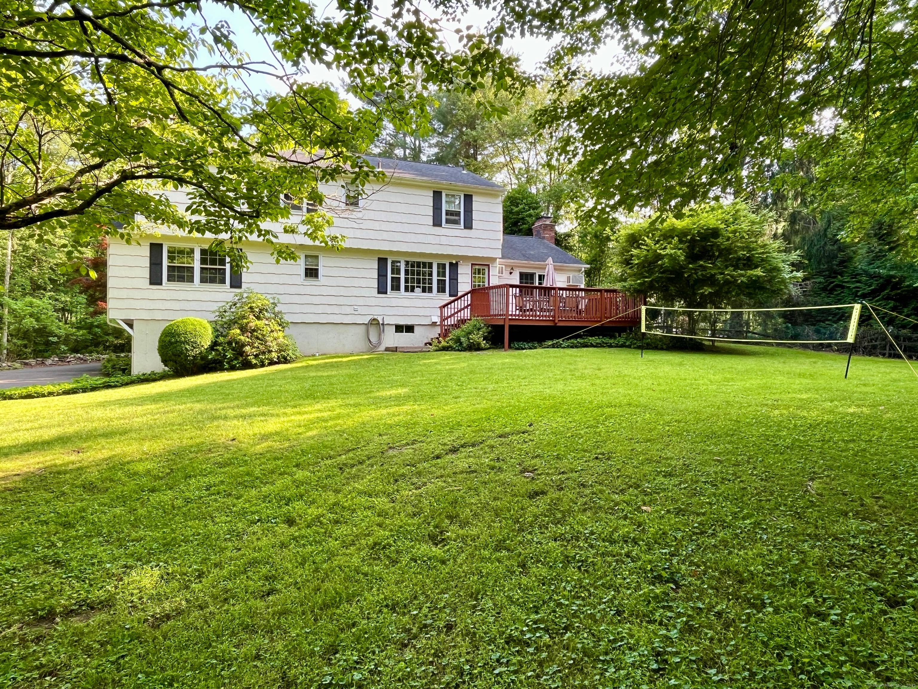 You'll enjoy living at the end of a quiet cul de sac in this coveted Tashua neighborhood.
