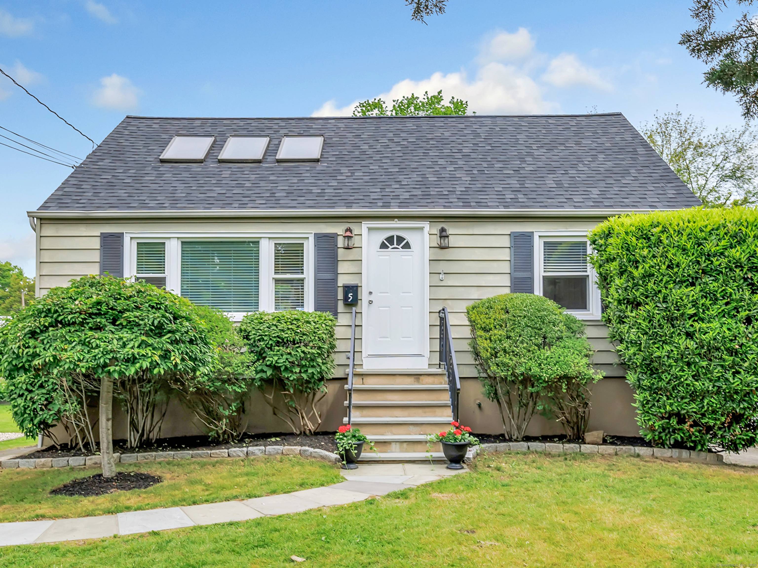 Welcome to this beautiful, updated cape in the heart of the desirable Wolfpit neighborhood.