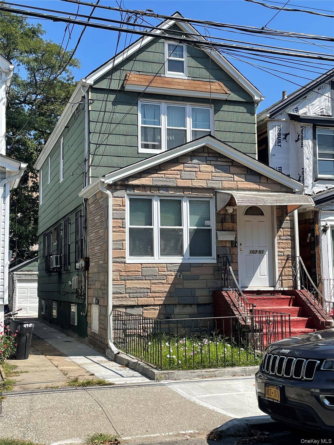 Welcome to this beautifully maintained modern 2 family home.