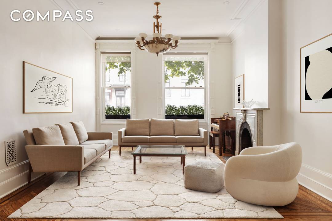 Perfectly perched in the heart of Carnegie Hill, one of the Upper East Side's most desired enclaves, 128 East 92nd Street is a recently renovated Queen Anne Style townhouse on ...