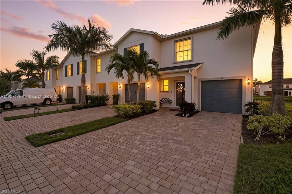 FALL IN LOVE with this exceptional North Naples townhouse being sold Turnkey Furnished, nestled in Meadowood one of the MOST SOUGHT after communities.