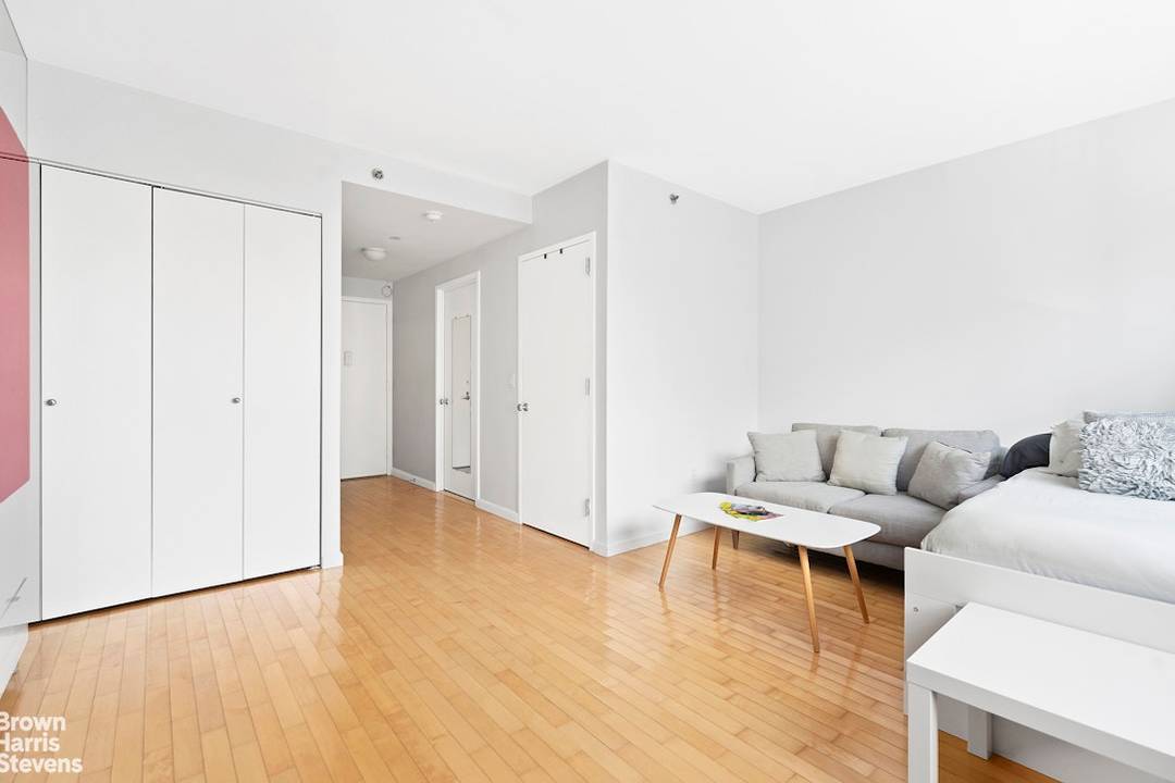 Loft like studio featuring 10 foot ceilings and oversized windows facing East with wonderful light and no wasted square footage in a luxurious full service condominium.