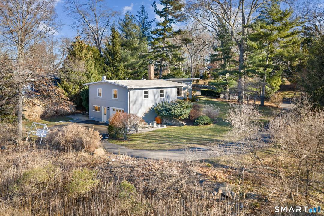 Summer perfection. Enjoy a private beach, tennis courts, and marina in Norwalk's best kept secret, the coastal community of Village Creek.