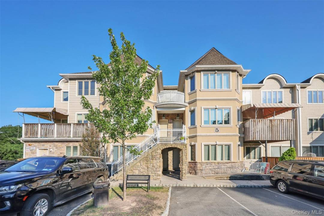 Welcome to 5 Rose Garden Way, Unit 302 a rare opportunity to own a spacious and sun filled 4 bedroom, 2.