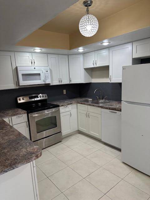 THIS BEAUTIFUL TOWNHOME, HAS 2 BEDROOMS, 2 1 2 BATHS, FENCED PATIO, BALCONY, WASHER DRYER AND 2 ASSIGNED PARKING SPACES, PETS ARE WELCOME.