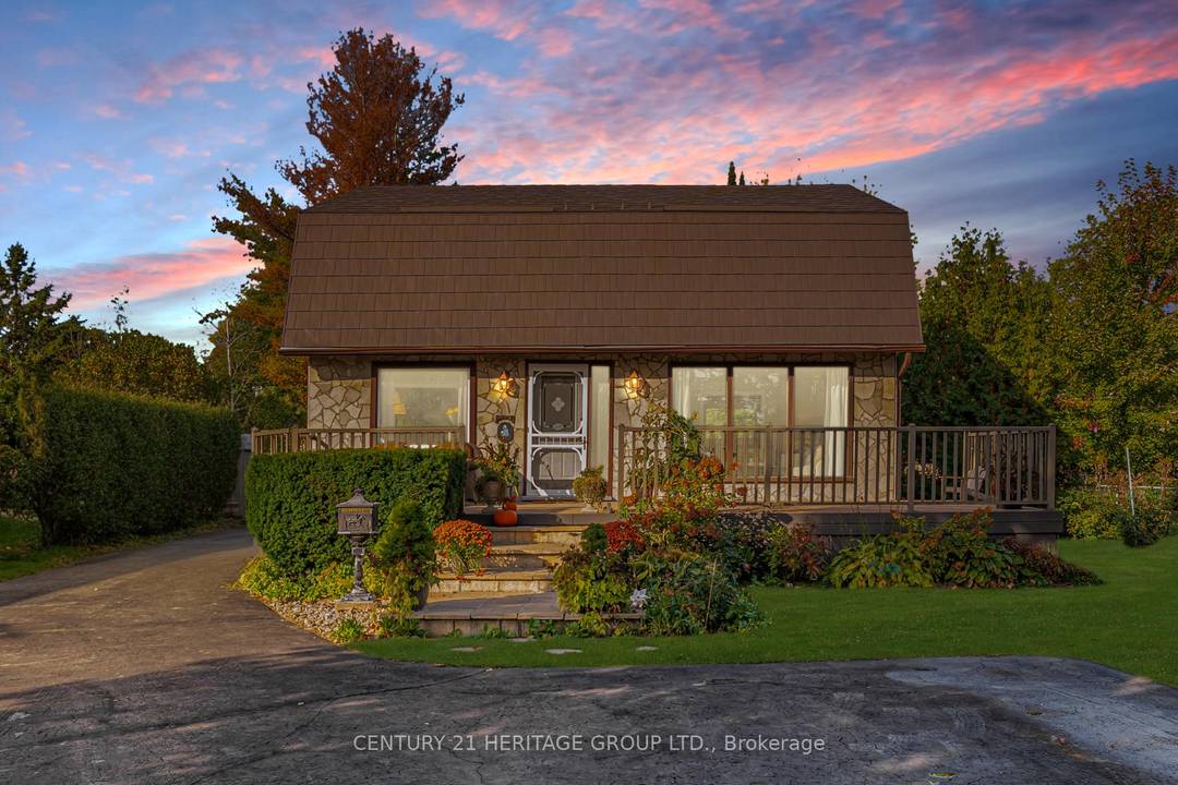 Welcome to this picture perfect family home tucked near the Holland River where country charm meets everyday convenience !