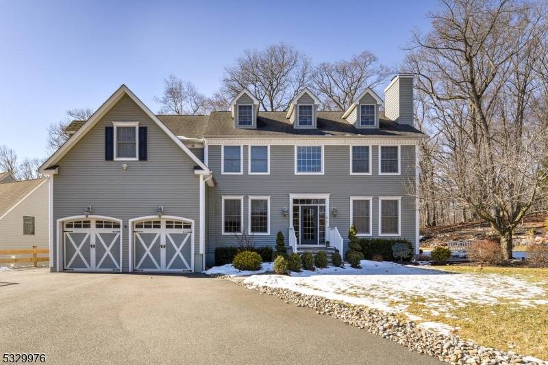 Welcome to this stunning Colonial home, a perfect retreat that blends tranquility with convenience.