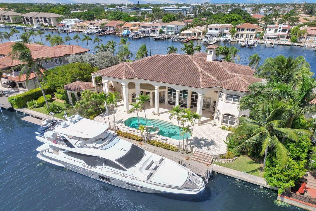 Experience waterfront living at its finest in this beautifully reimagined custom estate in Tropic Isle South, one of Boca Raton's most exclusive gated enclaves.