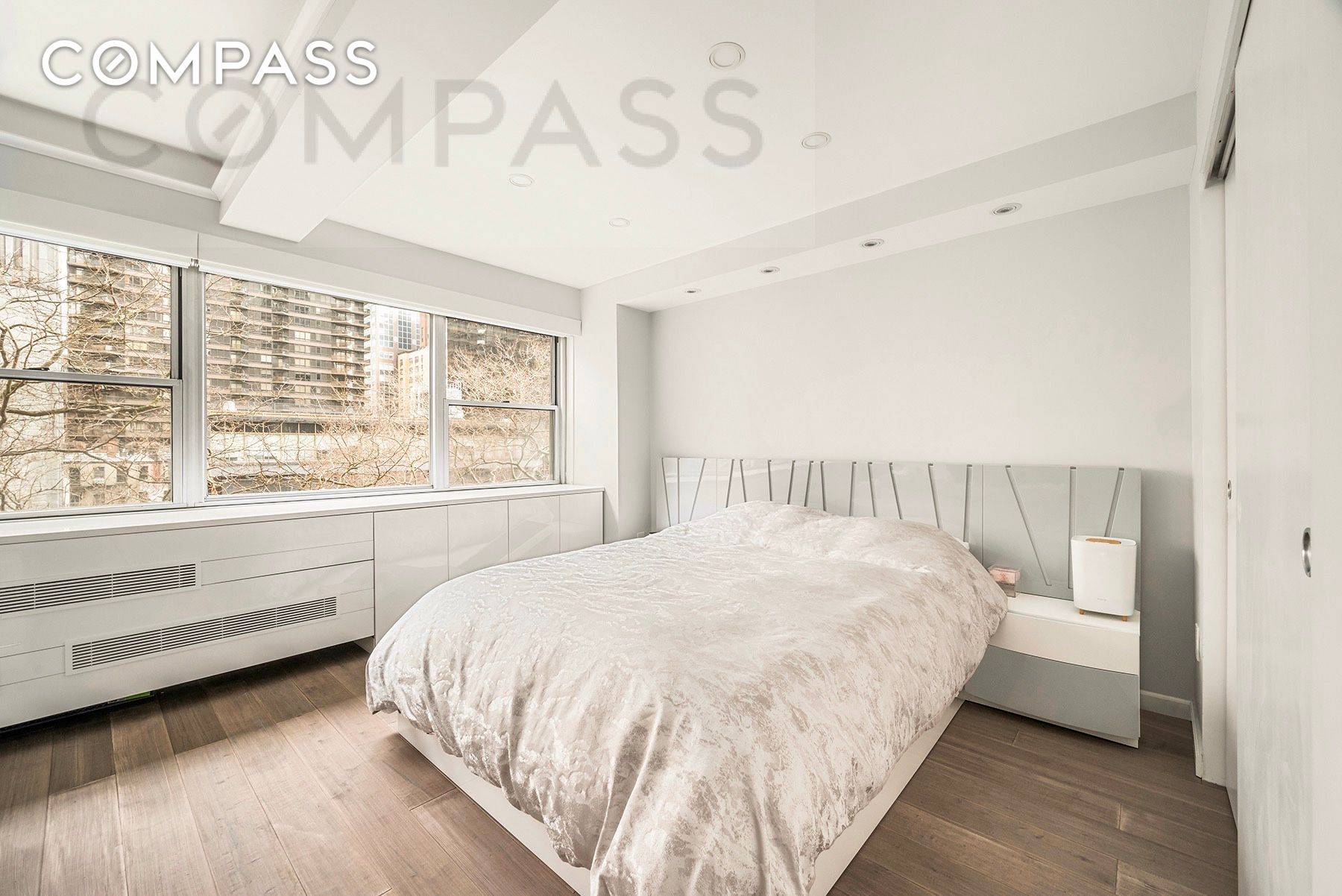 Welcome home to this meticulously renovated oversized alcove studio offering unparalleled comfort and style, complete with breathtaking open views of Dag Hammarskjo ld Plaza.