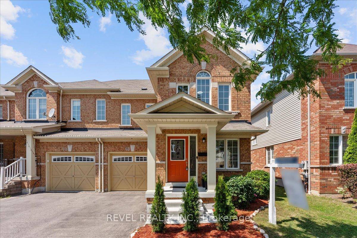 Welcome to 68 Elliotglen Drive a rarely offered, beautifully maintained 4 bedroom, 3 bathroom end lot townhome in the prestigious Northeast Ajax community.
