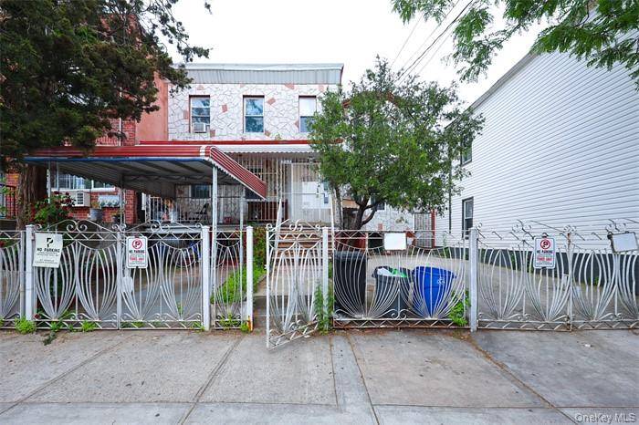 This charming two family townhouse is located in the East New York neighborhood of Brooklyn.