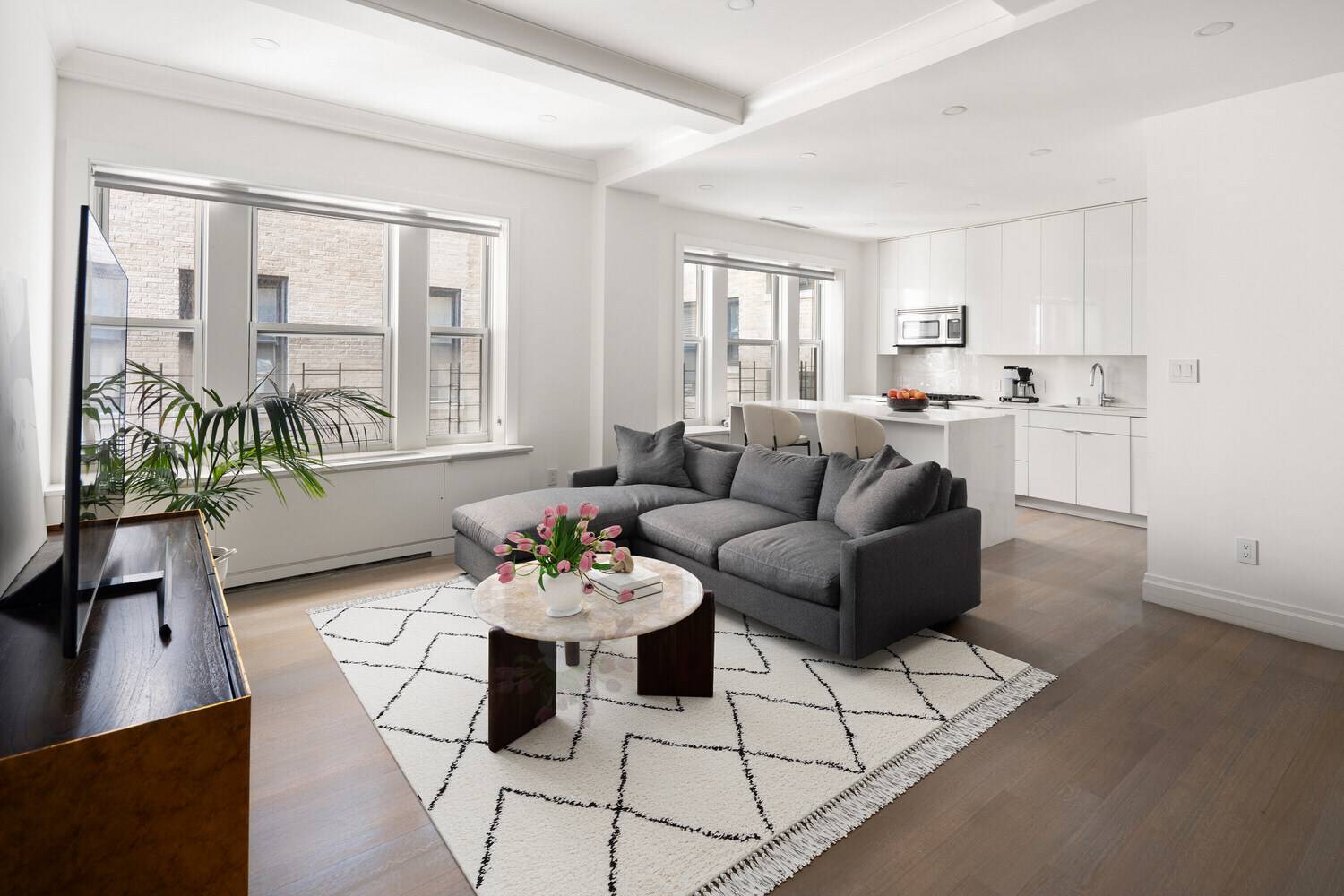 Newly Renovated 3 Bed 3 Bath Condo with Central AC, Washer Dryer, and Low Monthlies Experience the perfect blend of modern luxury and classic pre war charm in this completely ...