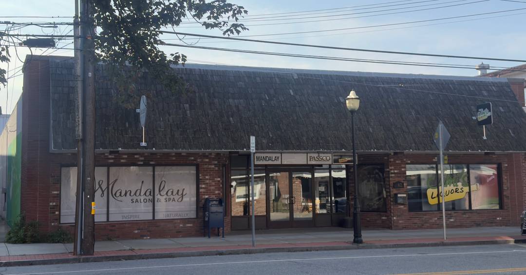 Prime commercial opportunity in the heart of Danielson with PARKING !