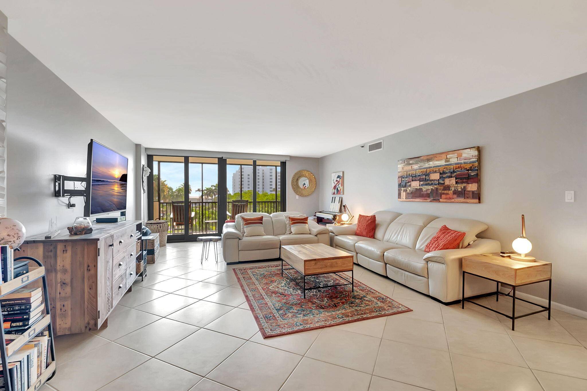 Experience the ultimate beach lifestyle at this completely renovated beautifully furnished condo in the Coronado of Highland Beach.