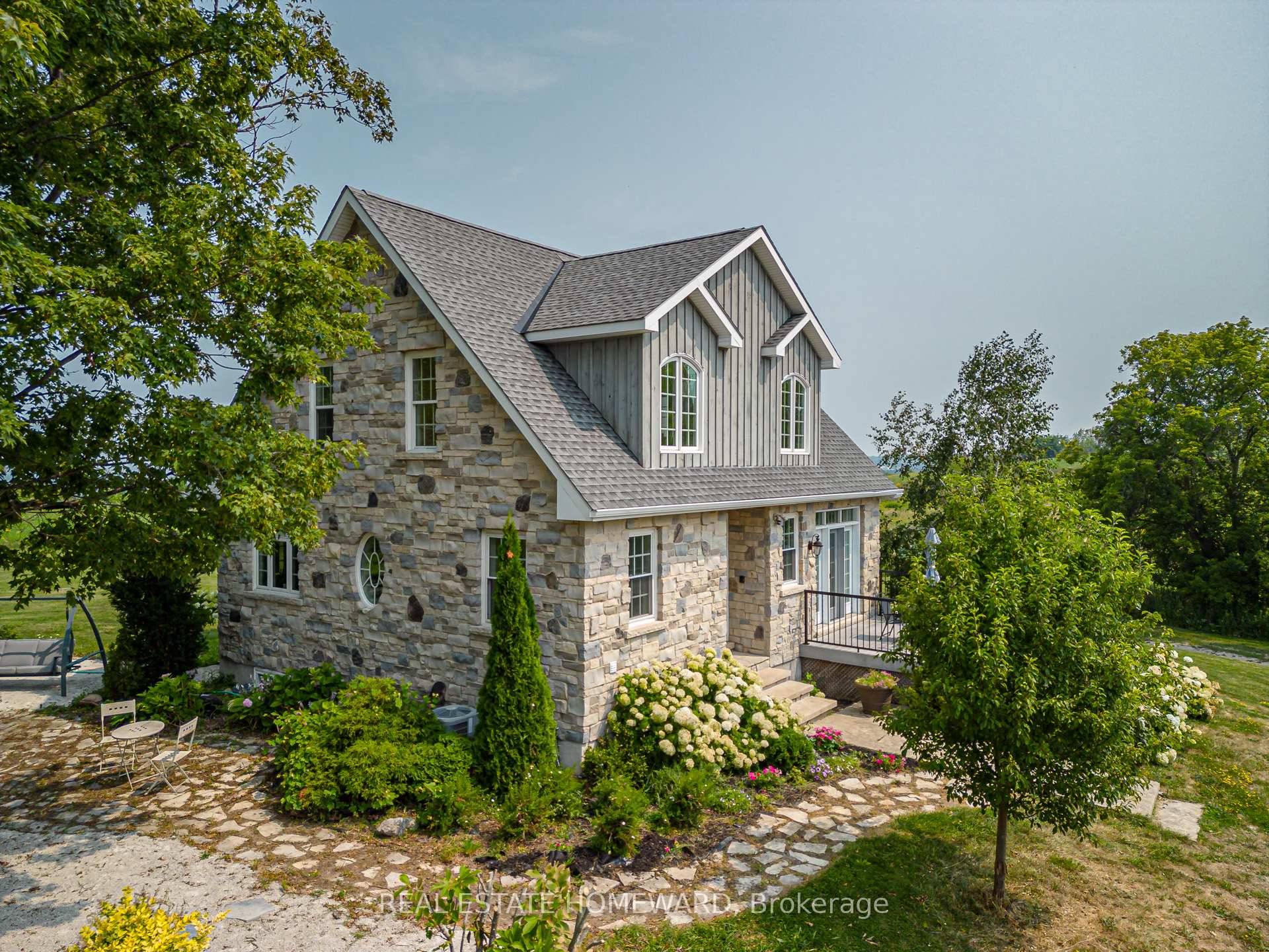 This one of a kind country estate, situated at the top of Scotch Mountain overlooking the town of Meaford, features a modern stone farmhouse originally designed by renowned architect Napier ...