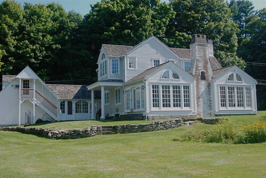 Utterly charming country home set only a couple of miles from both the villages of Lakeville, CT and Millerton, NY, on a quiet country road.