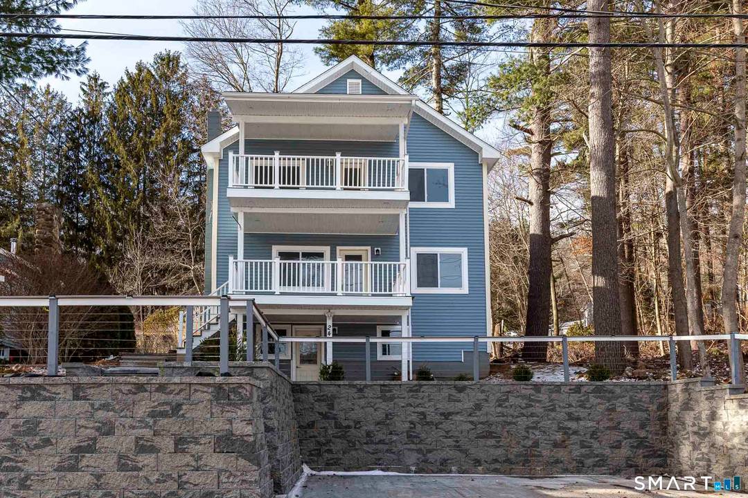 Lake Living at Its Finest Staffordville Reservoir Experience the perfect blend of luxury, lifestyle, and location in this stunning Colonial overlooking the Staffordville Reservoir, complete with lake beach rights approx.