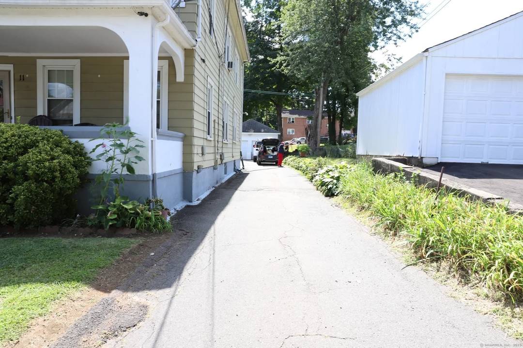 Well maintained 2 family home featuring two spacious units with separate entrances.