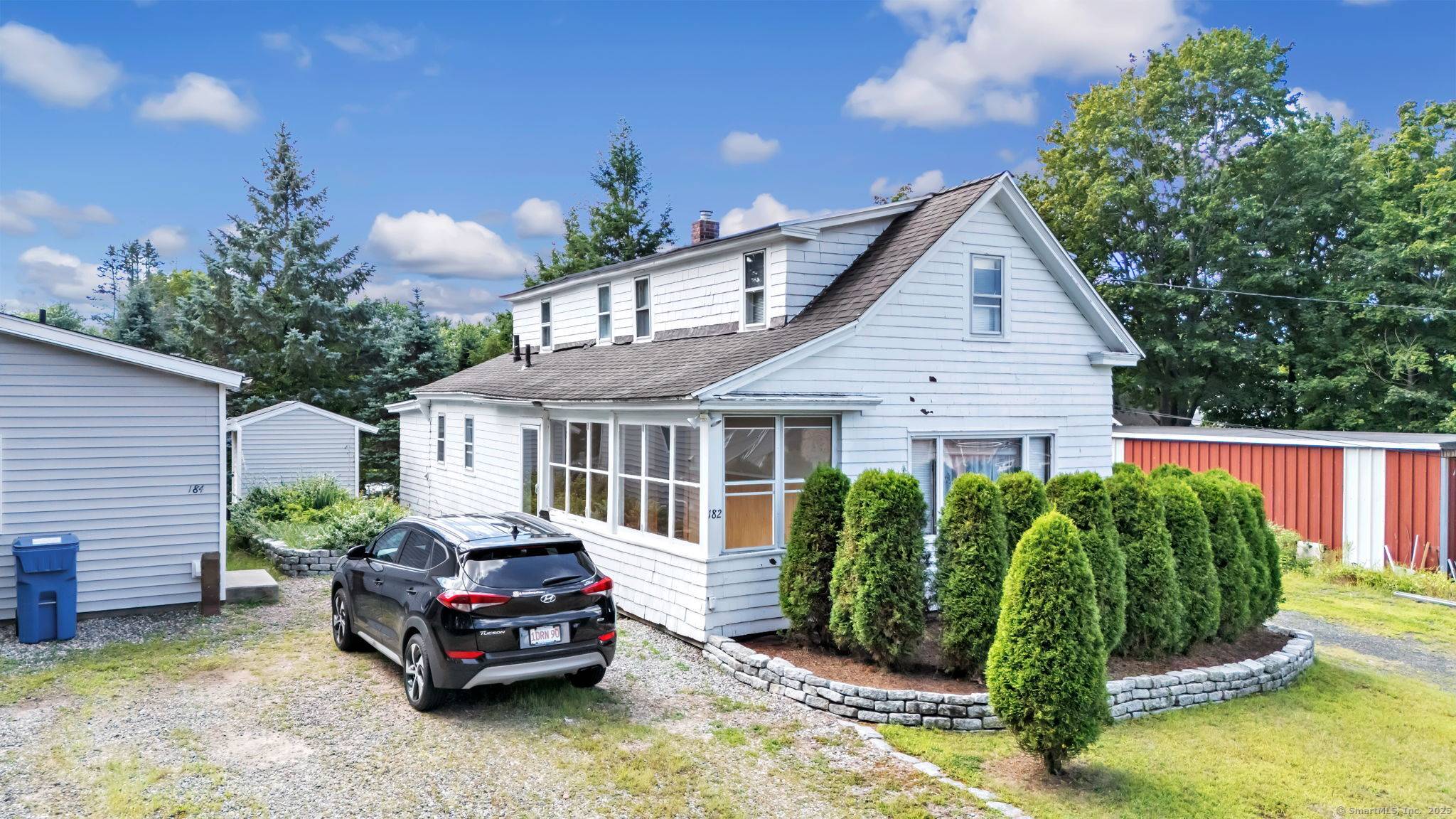 Rare opportunity in Manchester two single family homes on one lot !