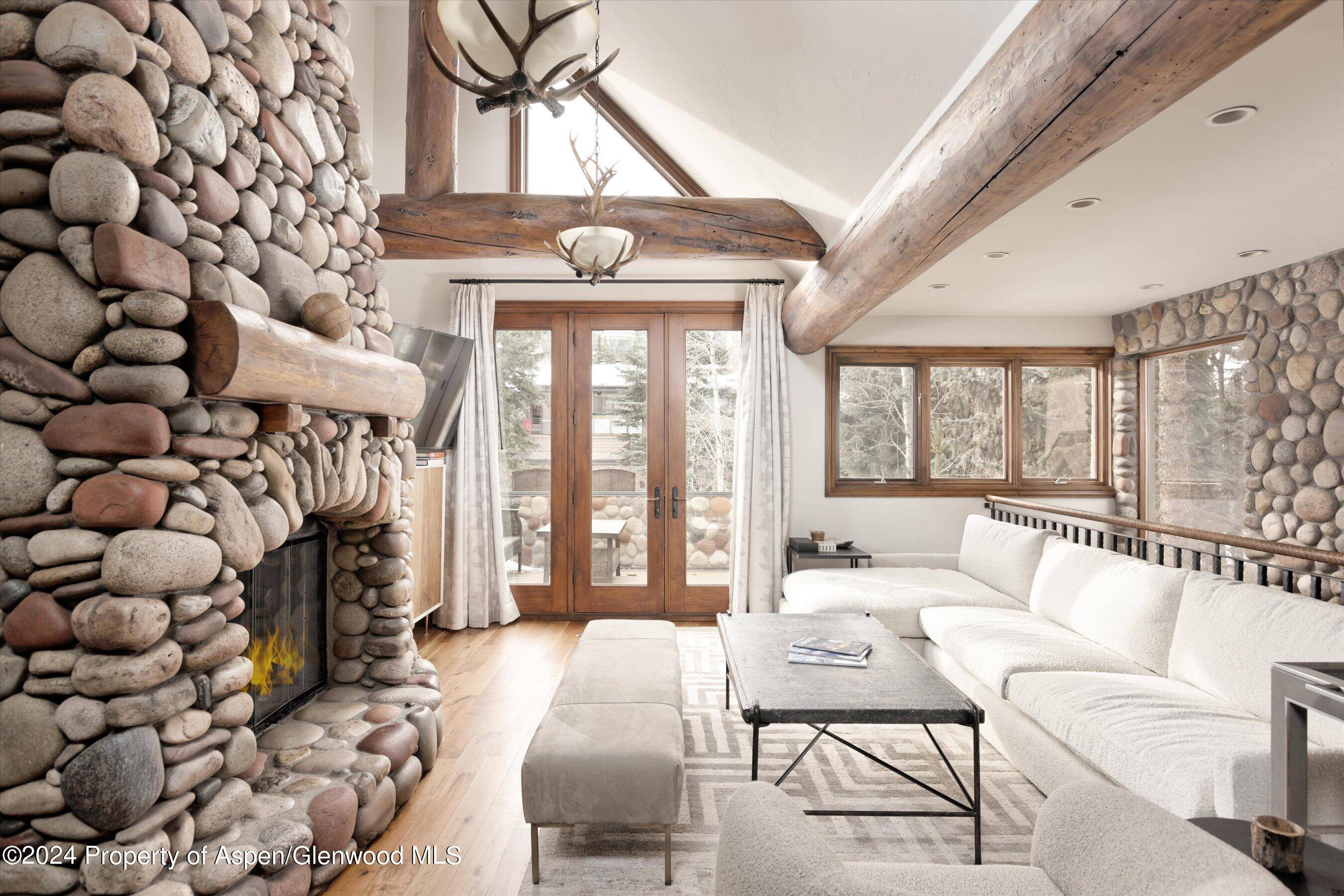 Nestled in the heart of Aspen, this mountain modern retreat at 1016 East Hyman Avenue, offers an unparalleled sense of solitude, privacy, and nature.