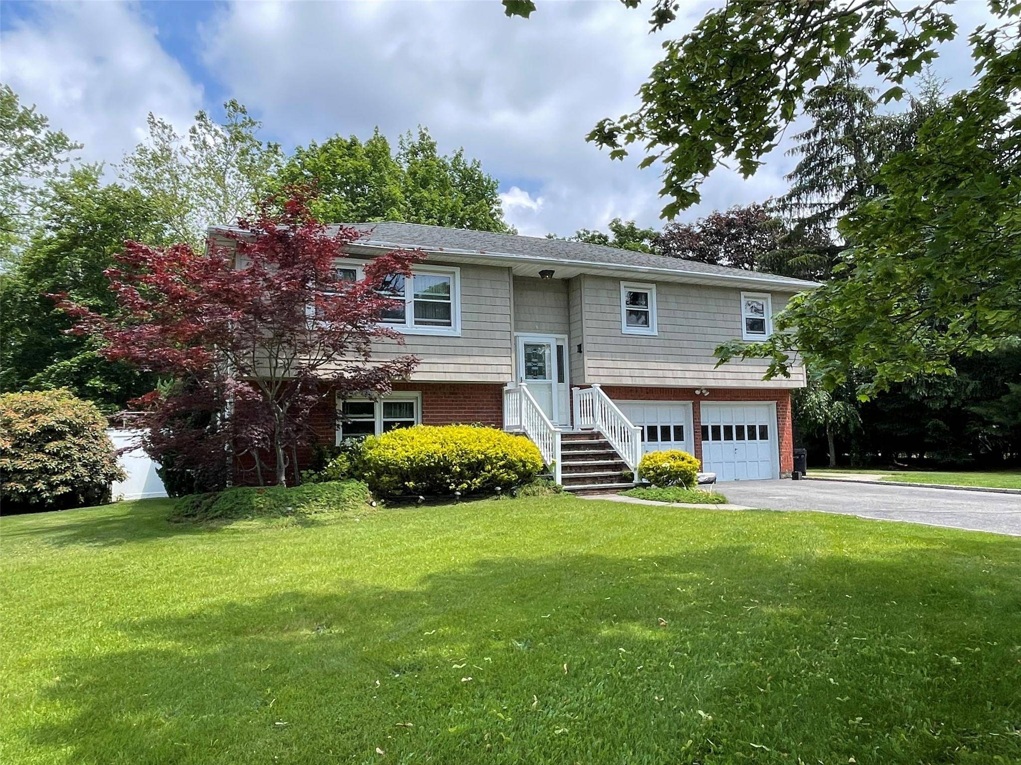 Welcome home to this stunning High Ranch single family house, complete with a fully permitted accessory apartment !