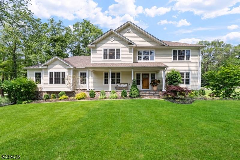 Welcome to this stunning Custom Colonial in the Pine Brook section of Montville Township.
