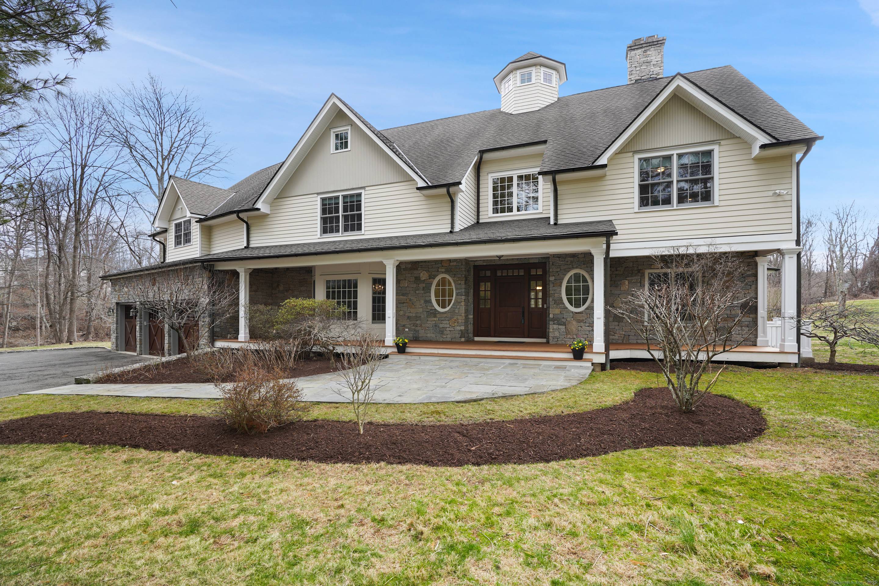 Nestled in Wilton's most prestigious enclave, the home offers nearly 3 acrs of breathtaking beauty privacy.