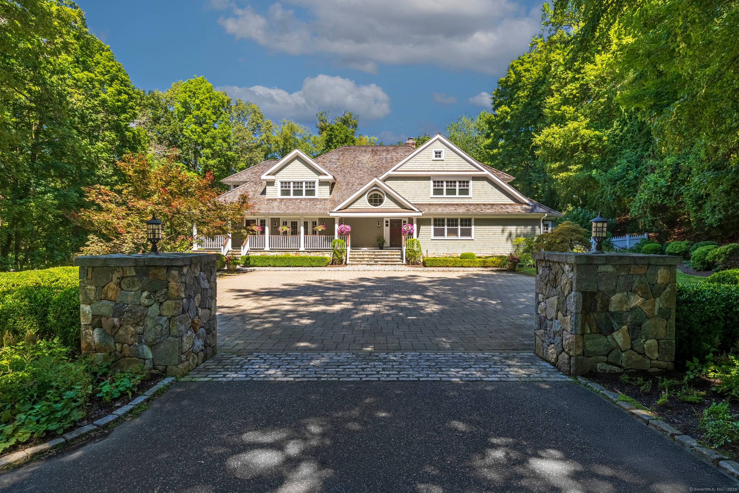 Nantucket Shingle coastal chic style home with exceptional amenities in Hoyt Farm.