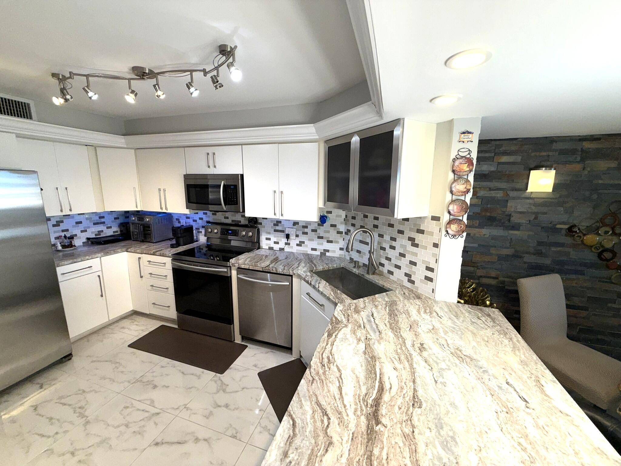 Welcome to this beautifully updated 3 Bedroom, 2 Bathroom condominium located in the prestigious Land of the Presidents community.