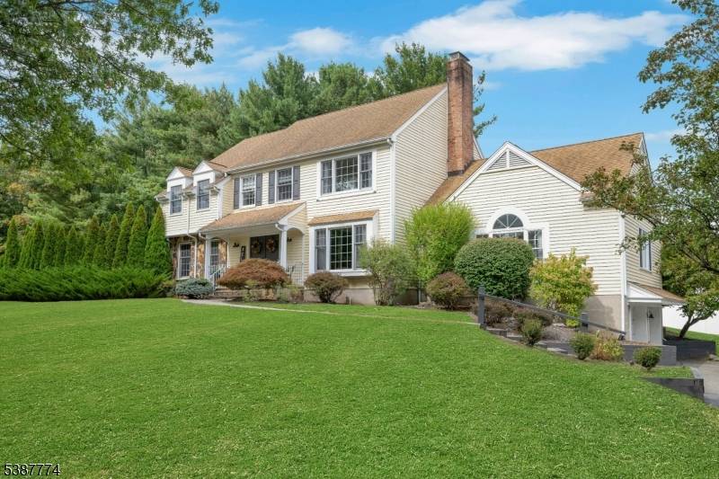Tucked away on a quiet horseshoe block in the sought after Hartley Estates neighborhood, this pristine five bedroom center hall colonial blends elegance with everyday comfort.