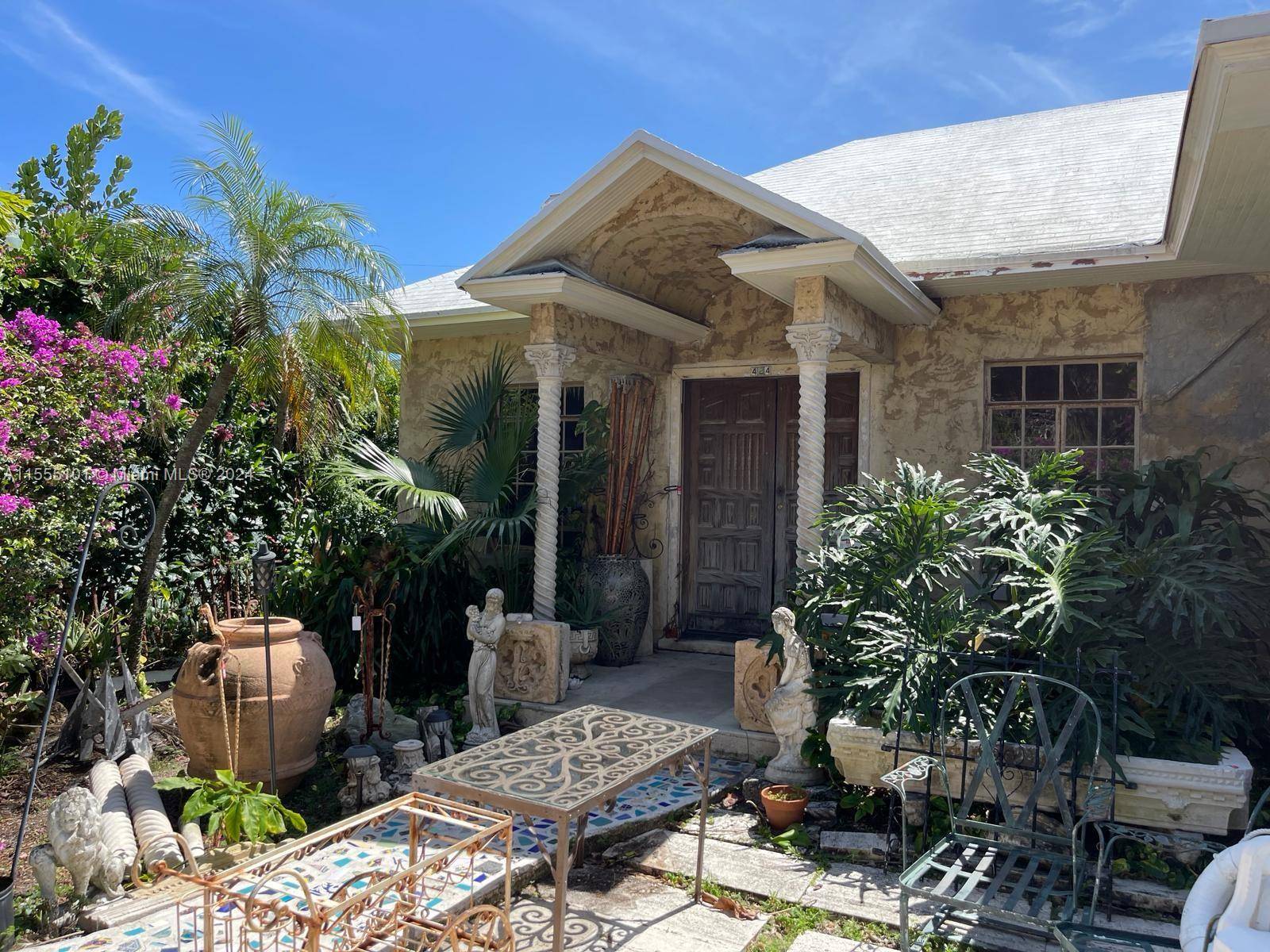 A Near Century Old diamond in the rough nestled in the heart of architectural history located adjacent to the former site of Addison Mizner s famed workshops.