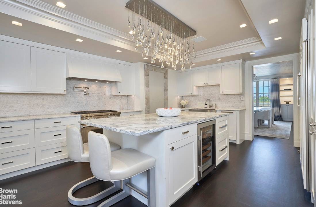 This impeccably renovated Fifth Avenue residence is the epitome of modern sophistication.