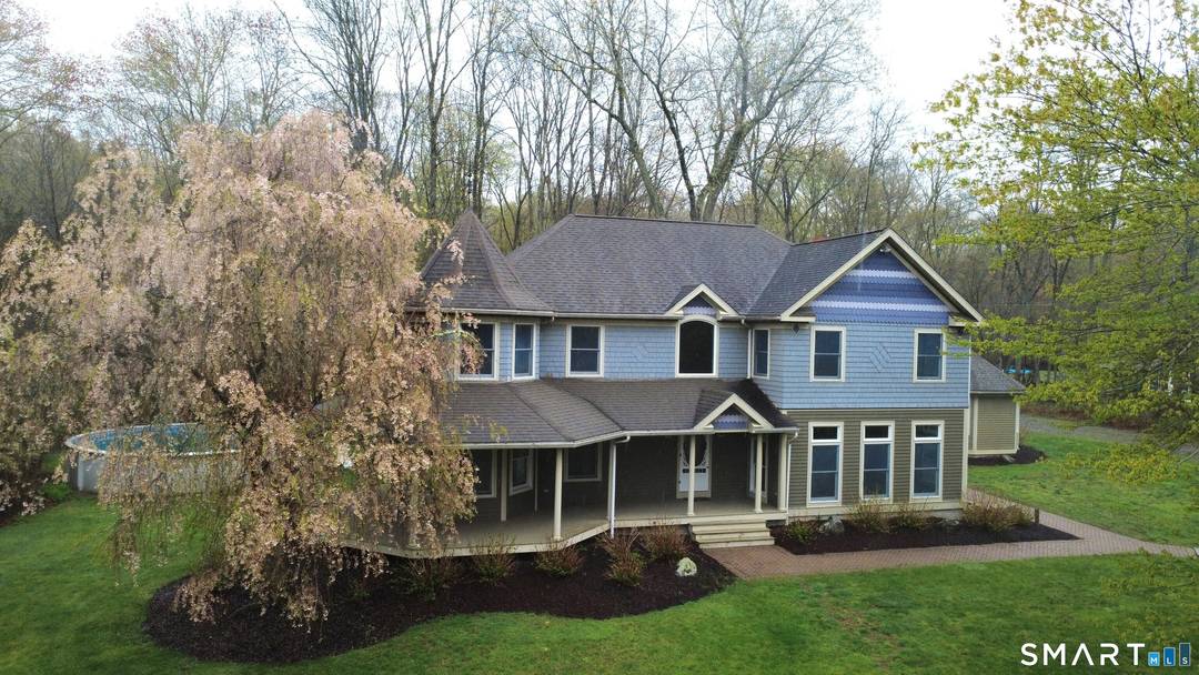 Move in to this beautiful spacious home set back on over 2 acres with mature trees, outdoor fireplace, above ground pool and mid size basketball court.