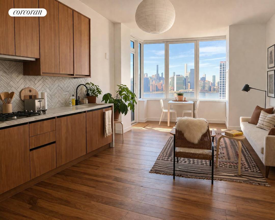 The East River and Manhattan skyline are yours, in one of Greenpoint's most luxurious buildings on prime waterfront.
