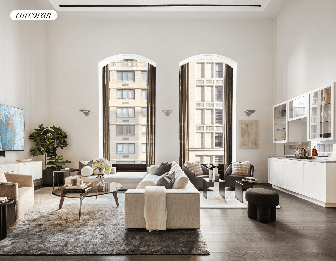 This exceptional designer home at 15 Union Square West offers the best of NYC living with dramatic ceiling heights, stunning arched windows, and complete serenity across two levels.