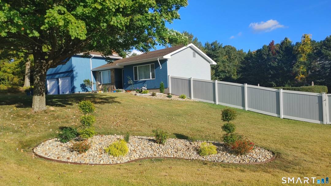 Welcome to this beautifully renovated contemporary L Ranch house located in sought after high end homes Martins neighborhood !