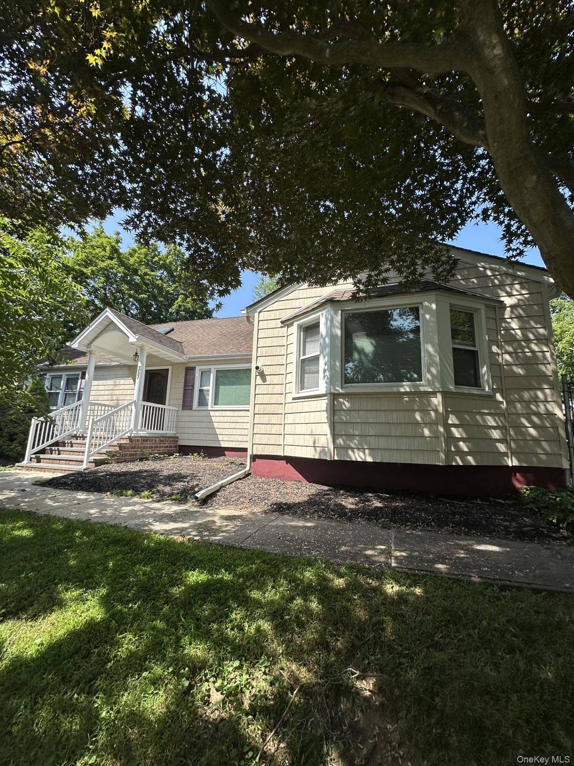 Welcome to 357 Deer Park Rd, Dix Hills a rare opportunity to own a full acre of prime property in the heart of Dix Hills.