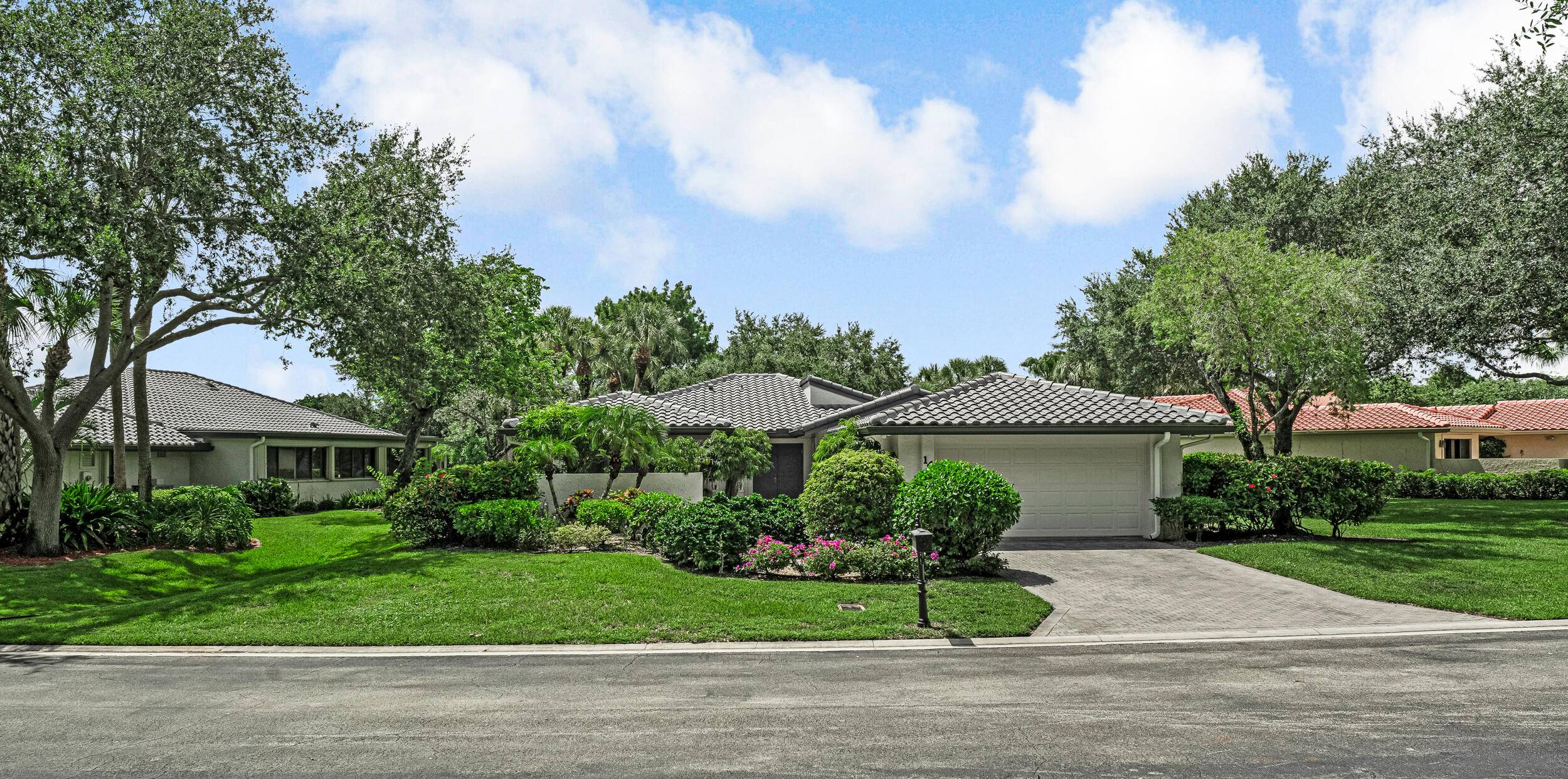 Spacious and light filled, this single family home features soaring ceilings, a brand new roof, and an inviting open layout.