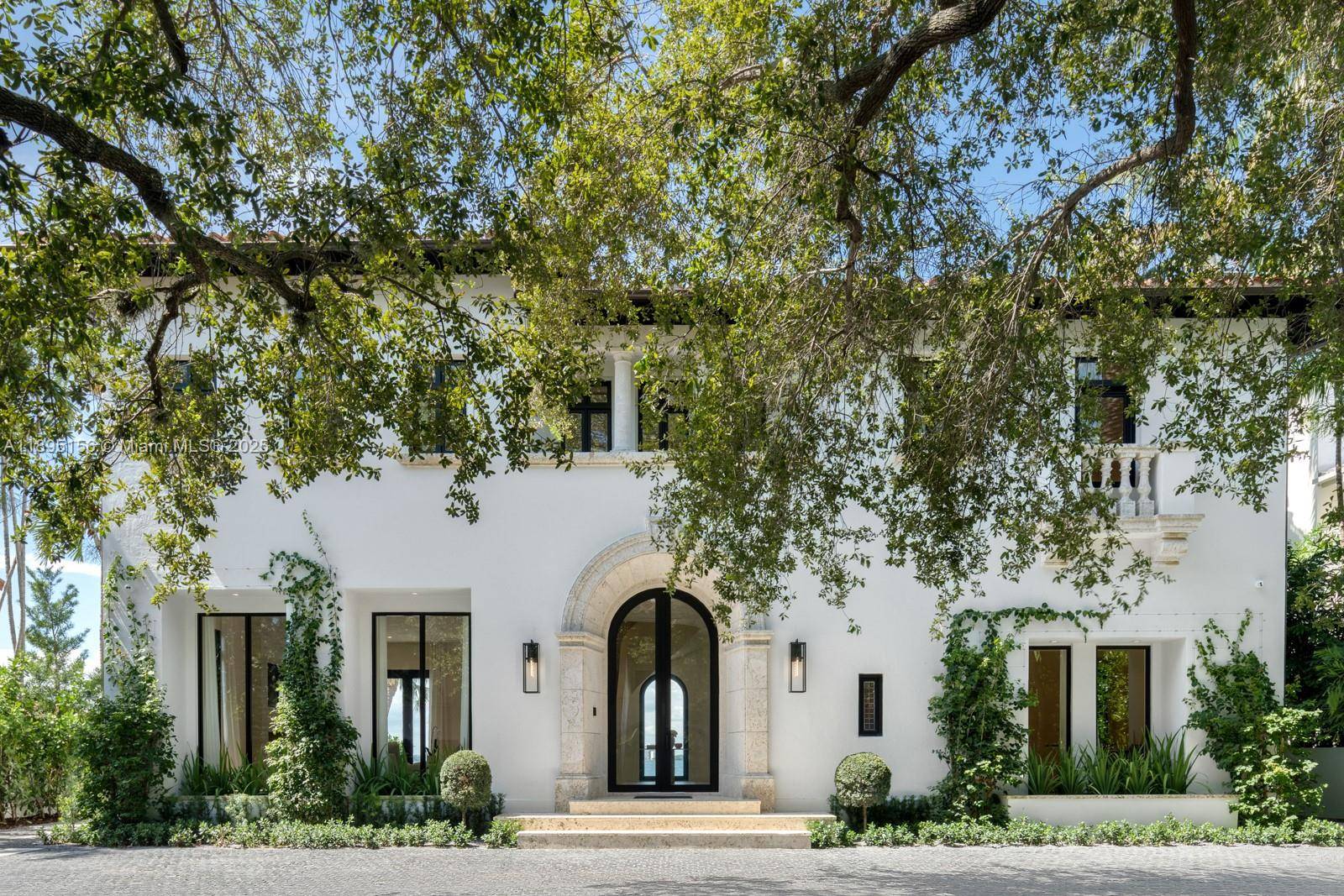Timeless Architecture Reimagined with Modern Elegance on Iconic N Bay Rd.