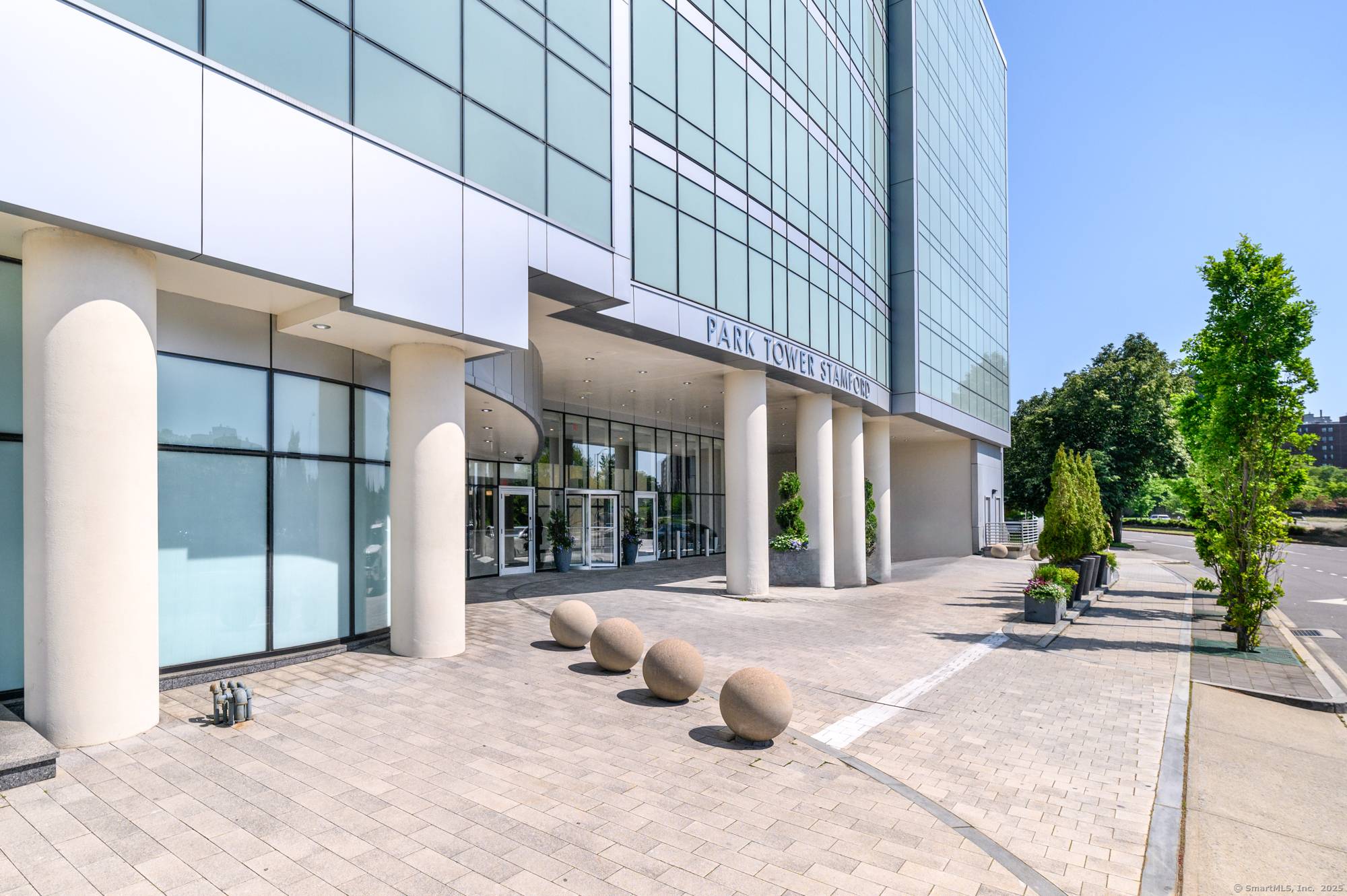 Experience luxury living in this sun drenched corner unit at Park Tower, a pet friendly high rise in the heart of vibrant downtown Stamford.