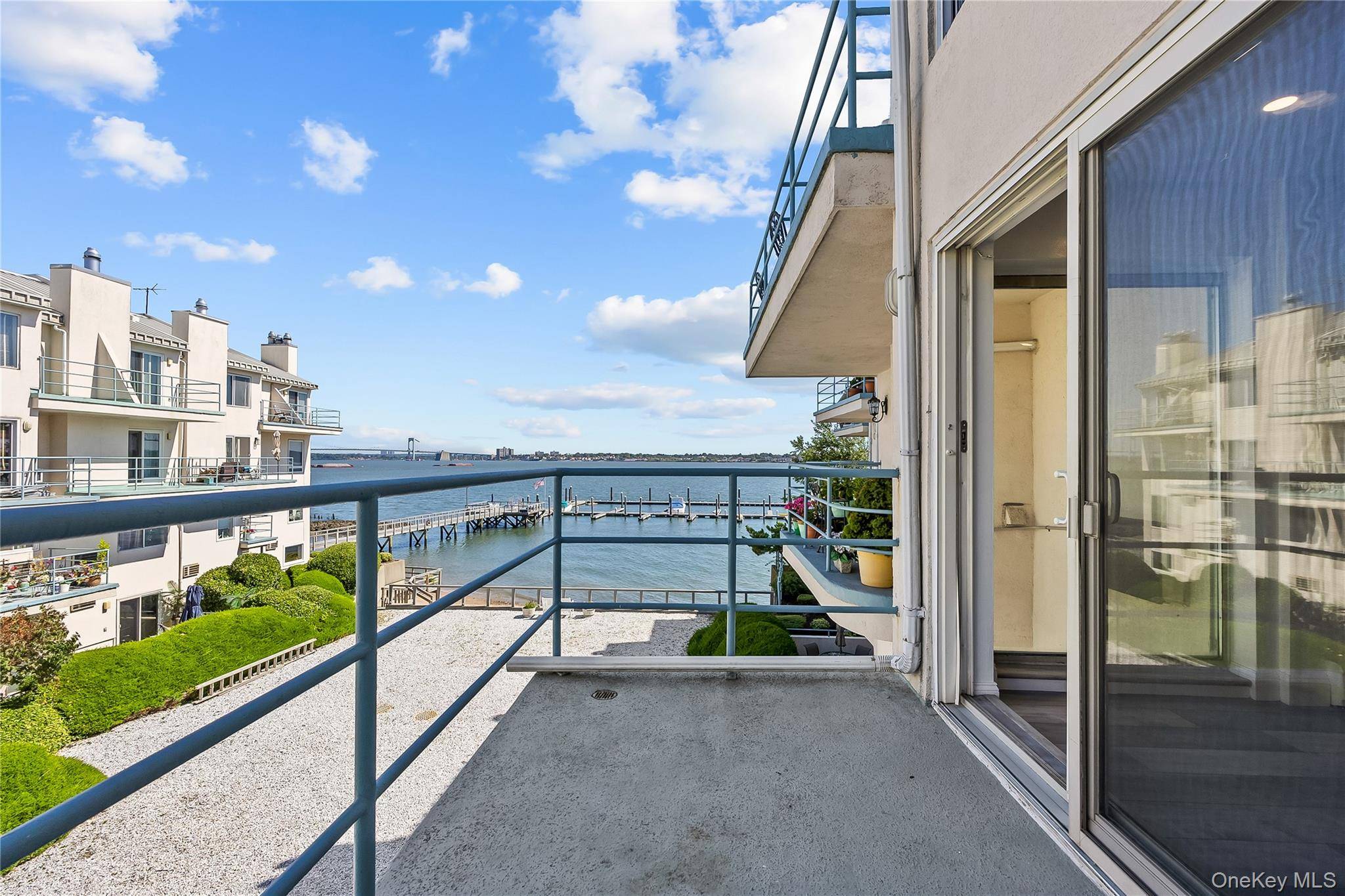 Welcome to this waterfront 3 bedroom, 3 bath duplex in the exclusive gated community of White Beach Condominiums in Throggs Neck.