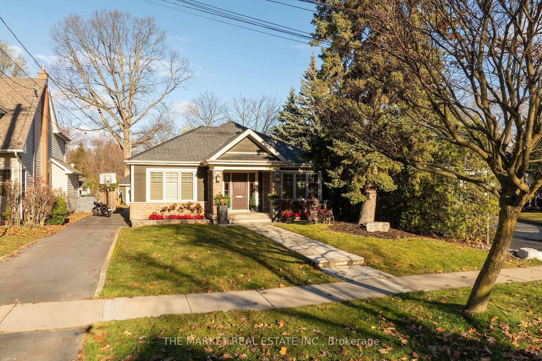 This stunning high end custom renovation enlargement offers a unique, exquisitely appointed home for downsizers and small families !