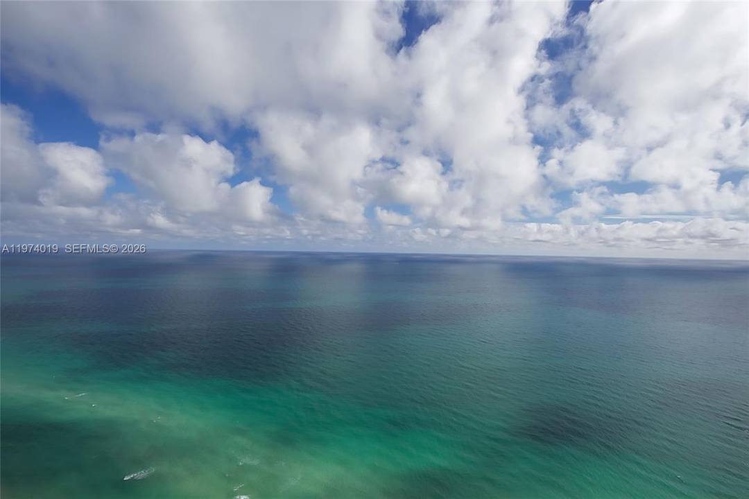 AMAZING OPPORTUNITY to own a residence in the most coveted line of the iconic Porsche Design Tower.